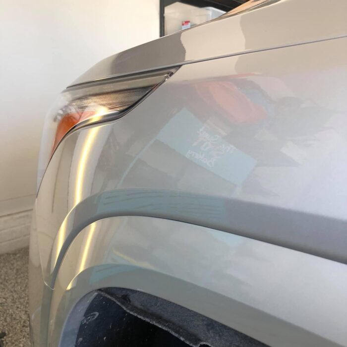 After picture of paintless dent repair on a gray SUV