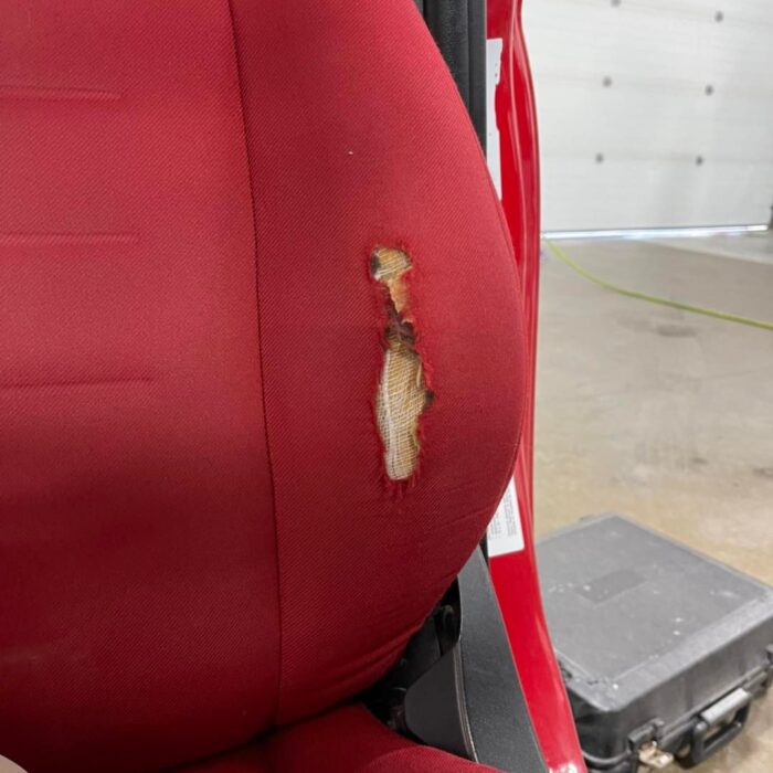 ripped red upholstery